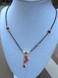Black beads chain with Ruby flower type pendent ***FREE SHIPPING***